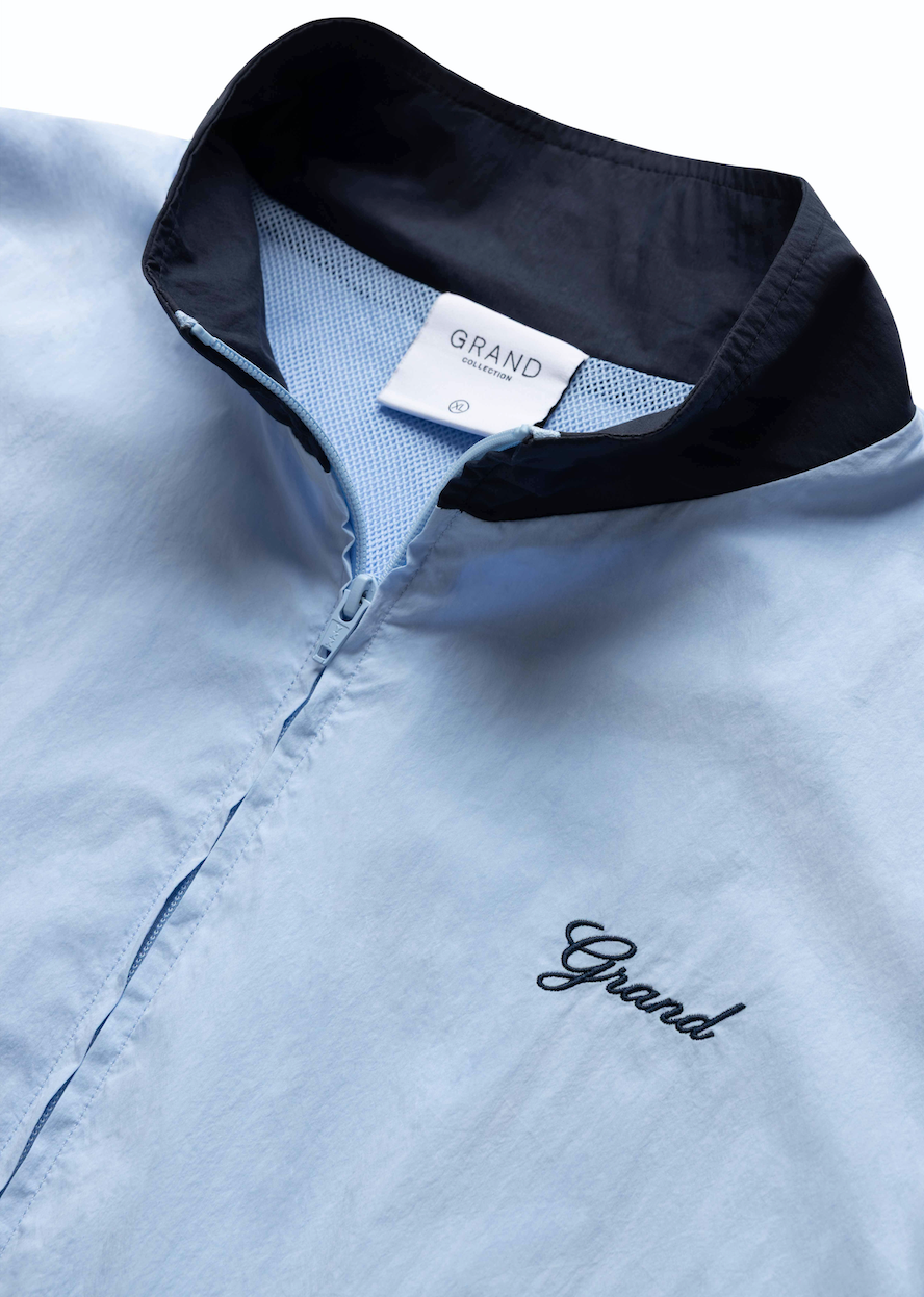 COTTON/NYLON TRACK JACKET POWDER BLUE/NAVY